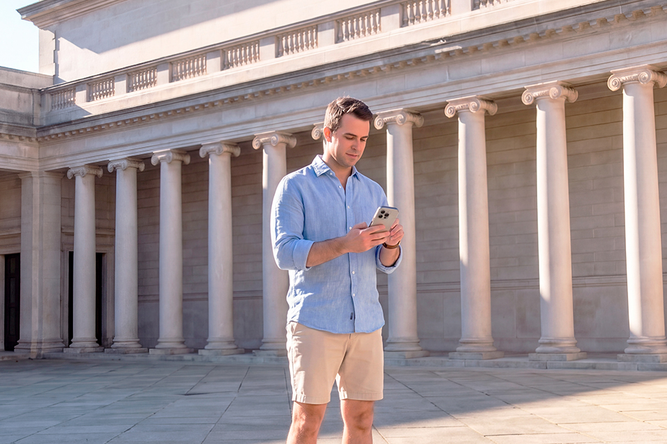 Man checking lottery strategies on his phone