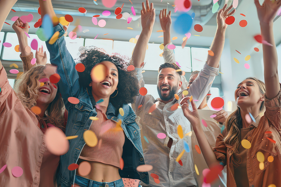 People celebrating together on International Lottery Day